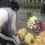 Buying Fruits from Street Vendors