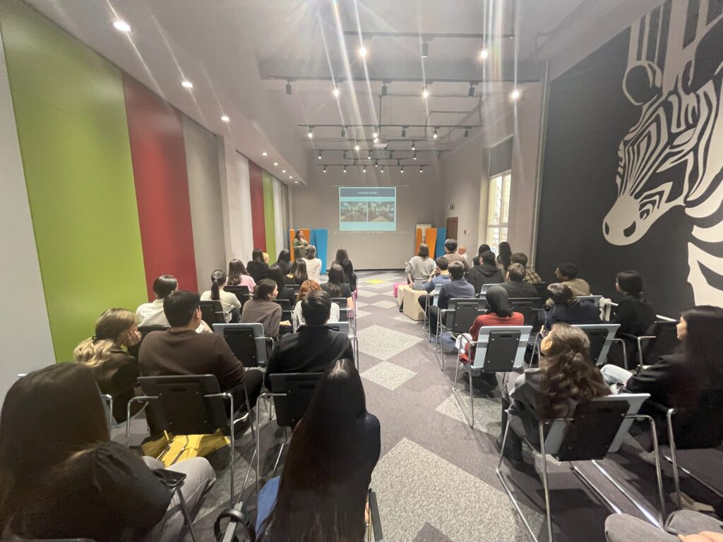 Spirit Cultural Exchange Job Fair in Kazakhstan Kazakh students watch a presentation at the Job Fair